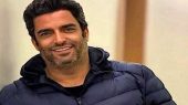 دکوراسیون اتاق کار جدید منوچهر هادی با تزیین قاب های زیبا